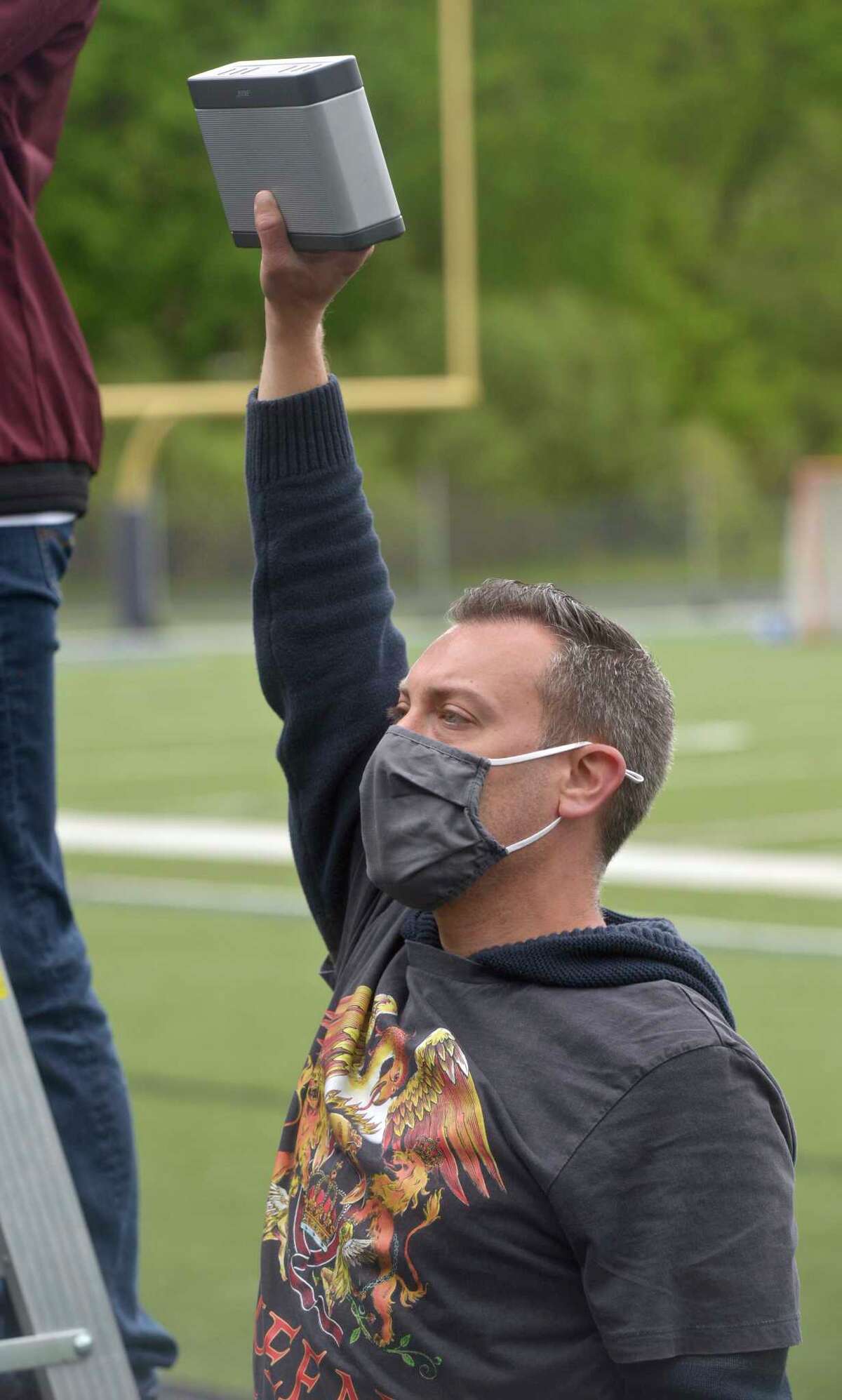 Matthew Farina, director and choreographer, directs students in the Immaculate High School video production of
