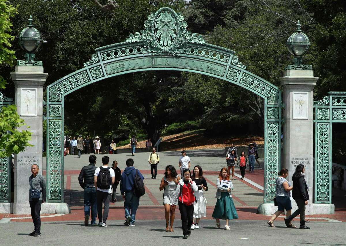 Students walk past UC Berkeley’s Sather Gate in 2018.