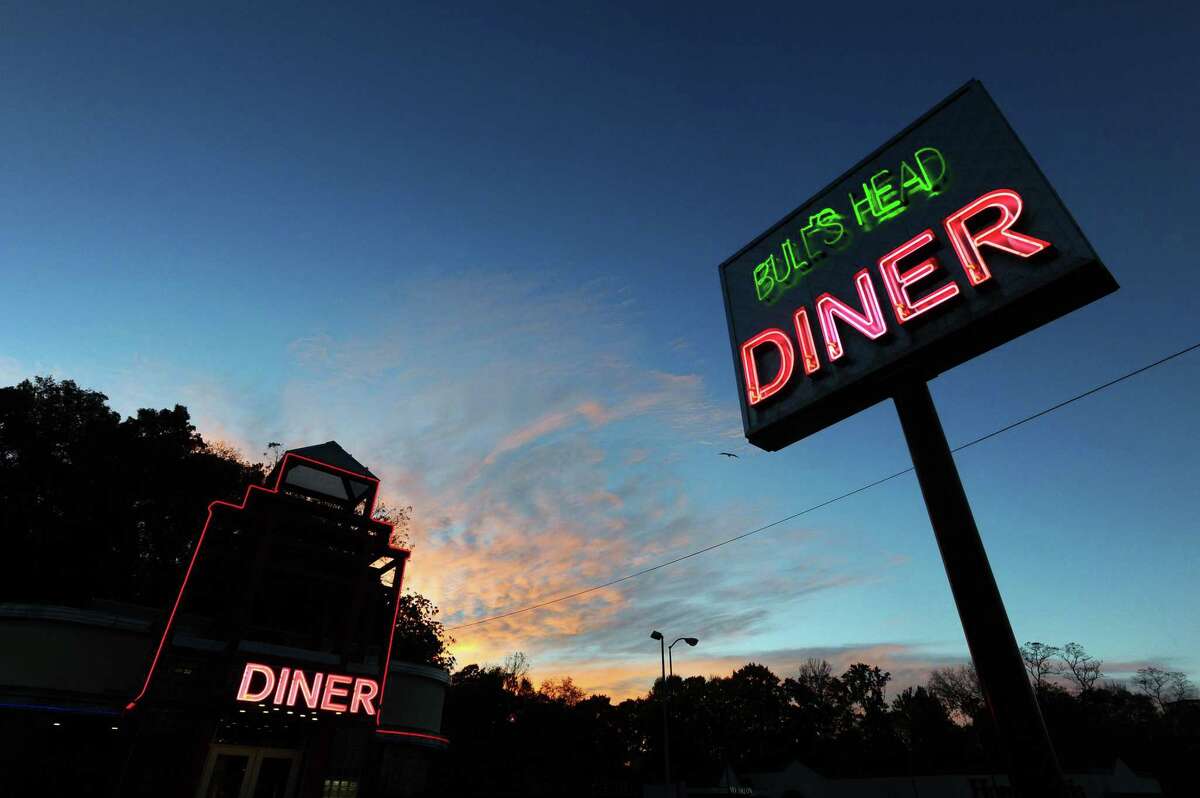 The sun rises behind the Bull's Head Diner in Stamford, Conn. on Sunday, Nov. 6, 2016.
