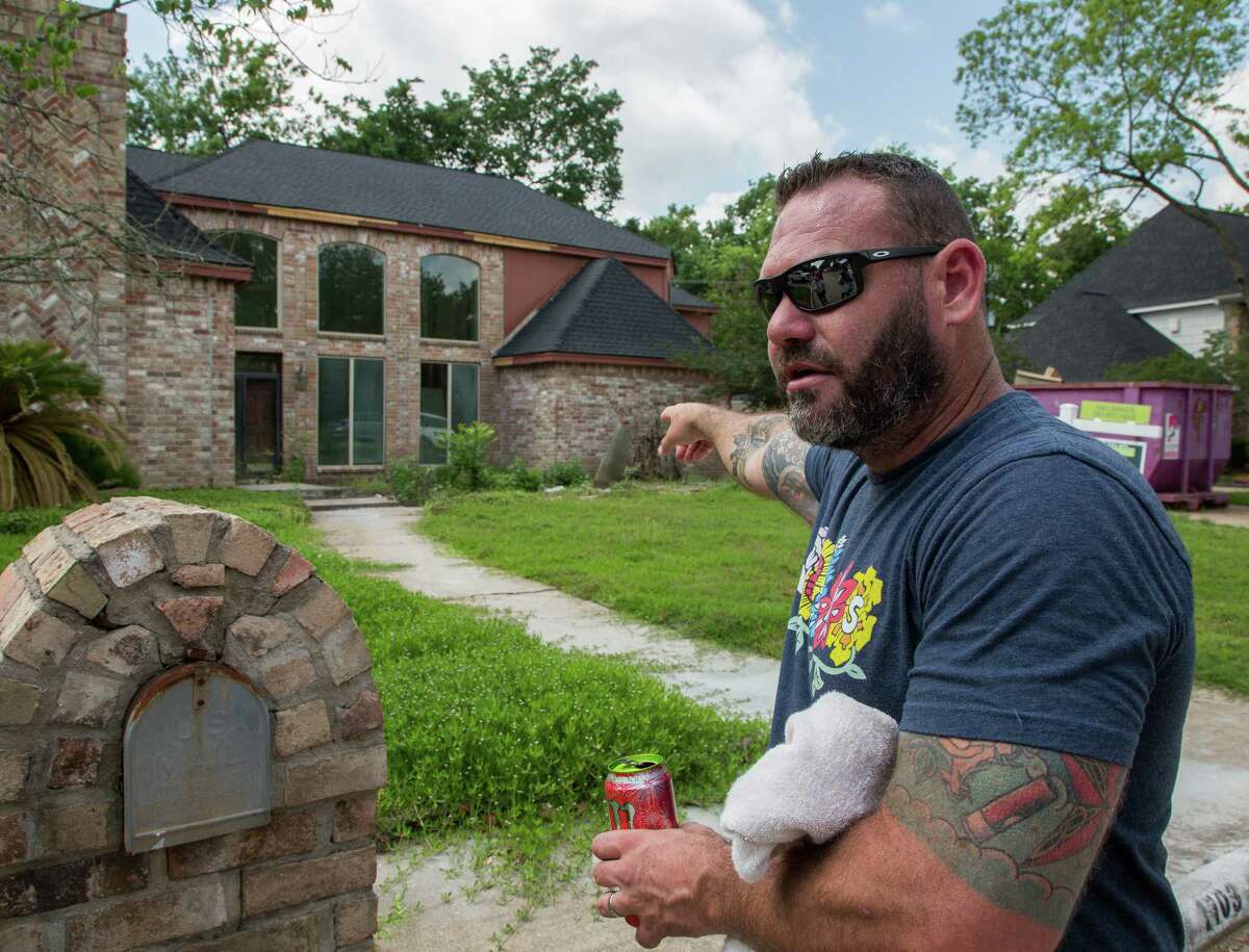 Waller County Sheriff's Office deputy Wes Manion talks about his encounter with a tiger yesterday on the 1100 block of Ivy Wall Drive on Monday, May 10, 2021, in Houston. Manion, who was off-duty at the time, arrived shortly after seeing posts by neighbors.