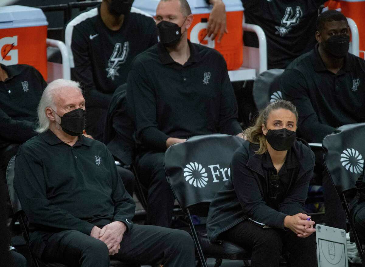San Antonio Spurs head coach Gregg Popovich and assistant Becky Hammon watch the action as the Spurs host the Milwaukee Bucks in the AT&T Center on Monday, May 10, 2021.