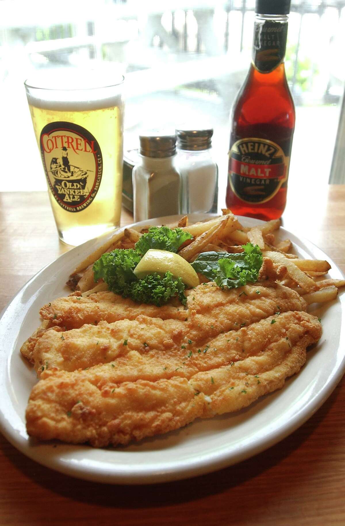 liv-fish house-ag-8/2 The fish and chips dish at the Flanders Fish Market and Restaurant as photographed on Saturday 8/2/2003. In the background is a draft Cottrell beer. Photo by Arnold Gold AG0051G Photo by Arnold Gold AG0051G