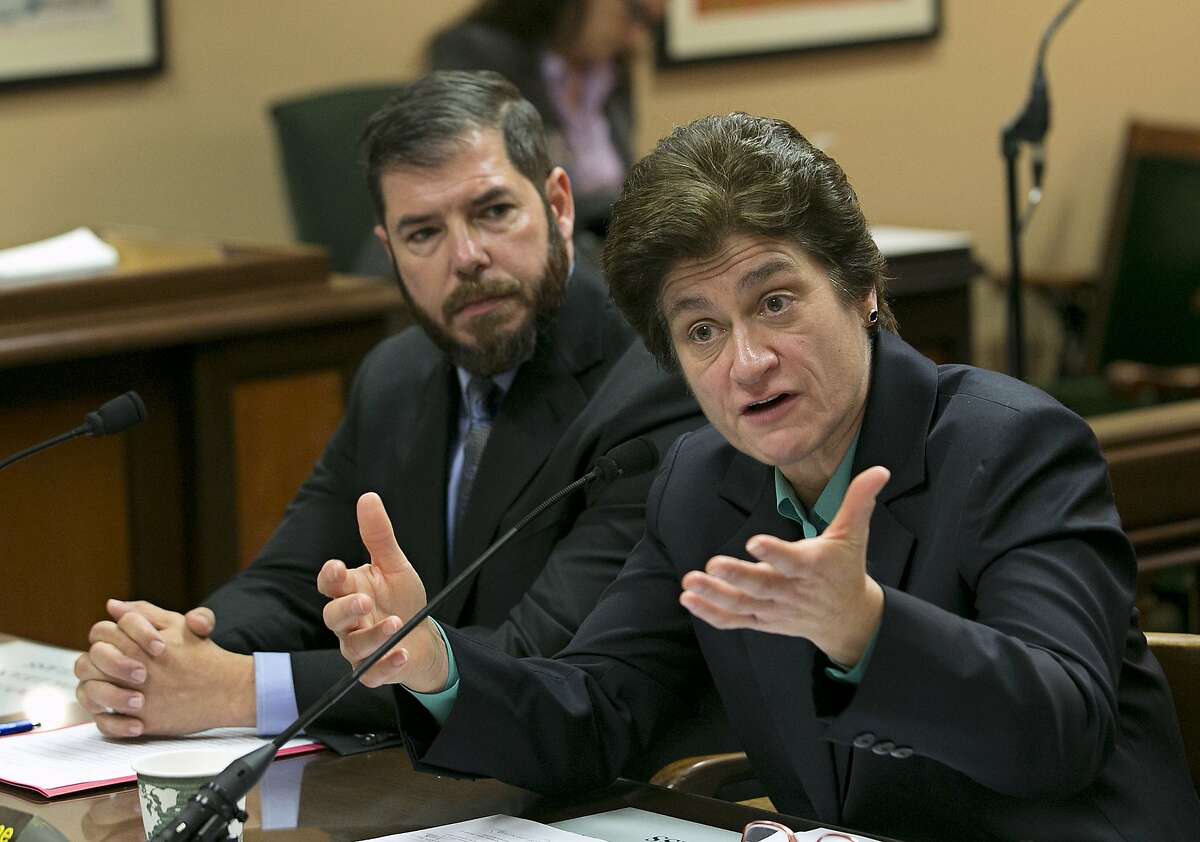 State Auditor Elaine Howle, right, at a state legislative hearing in January 2018 in Sacramento. At left is Democratic Assembly Member Joaquin Arambula. On Tuesday, Howle said in an audit that California’s new and fully online community college, Calbright, has graduated just 12 of its more than 900 students, seen 384 of them drop out and lost track of another 87.
