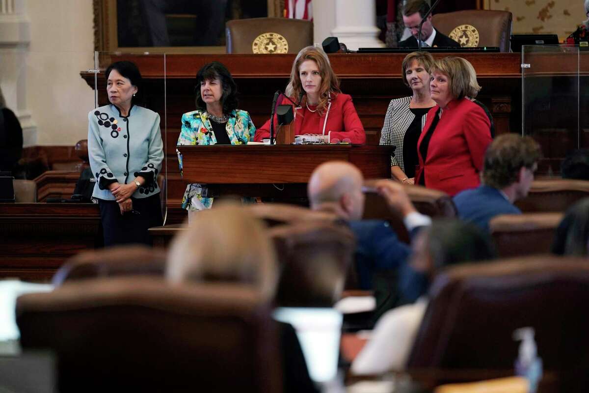 Texas state Rep. Shelby Slawson, R-Stephenville, center, stands with four co-sponsors as she answers questions about a proposed bill in the House Chamber, Wednesday, May 5, 2021, in Austin, Texas. Slawson co-sponsored the bill in Texas that banned abortions as early as six weeks and allows private citizens to enforce it through civil lawsuits. 