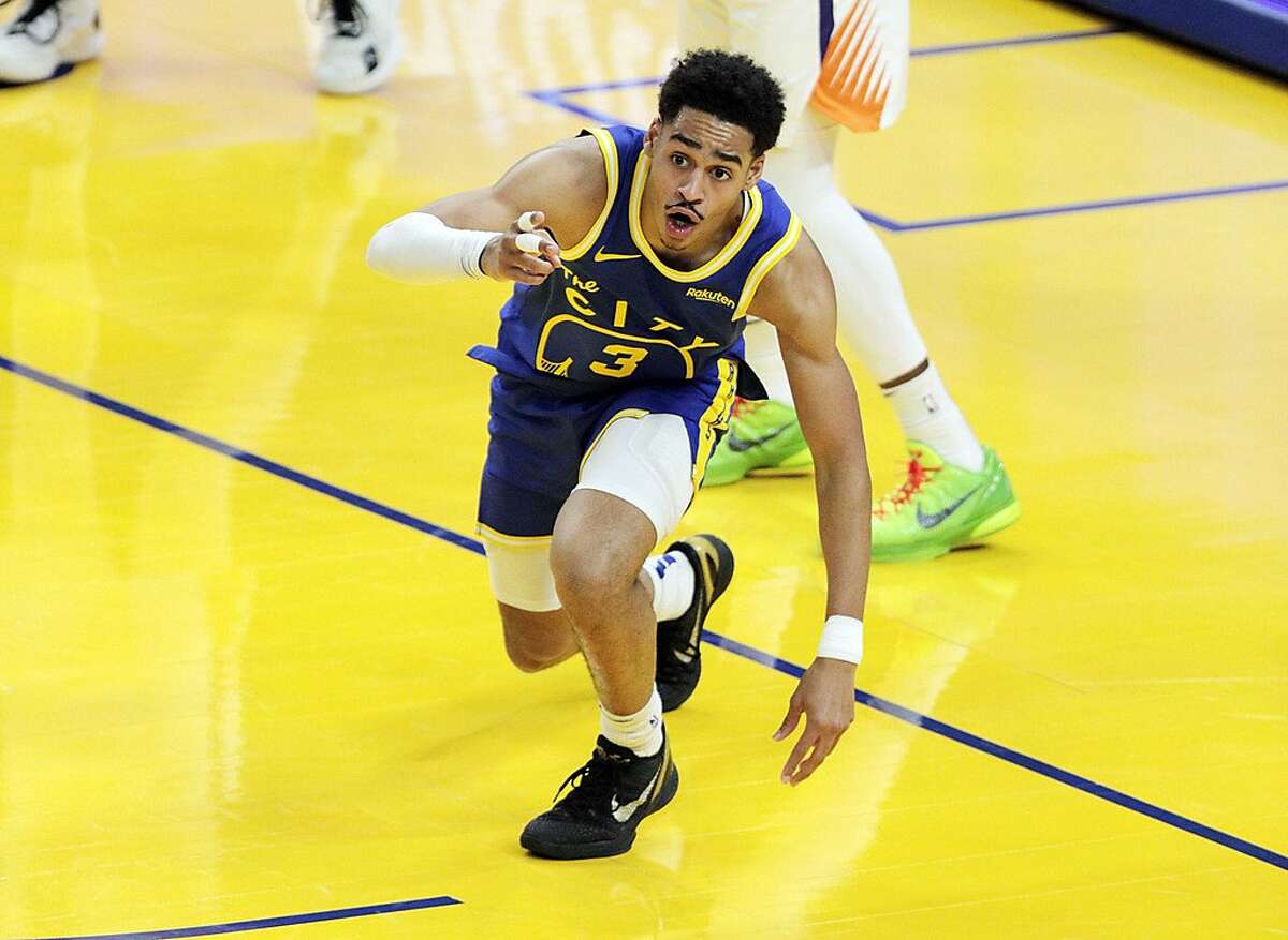 Jordan Poole reacts to a shot he made in the first half of the Warriors’ game against Phoenix Tuesday at Chase Center.