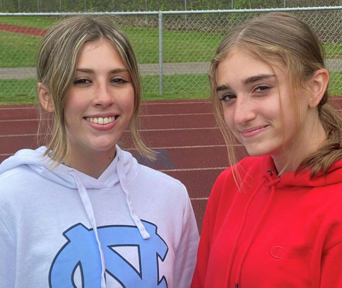 Sydney and Caden Simpson each won two events in Law's division-clinching victory at Guilford.