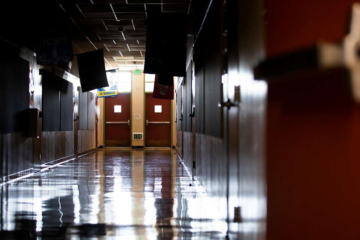 A kindergarten teacher at a school in West Contra Costa Unified, which reopened classrooms on a hybrid schedule for families who opted in, has chosen not to teach in person, and parents are asking why she’s now heading to Mexico. The halls of Garfield Elementary School are seen empty ahead of reopening in Oakland on March 23.
