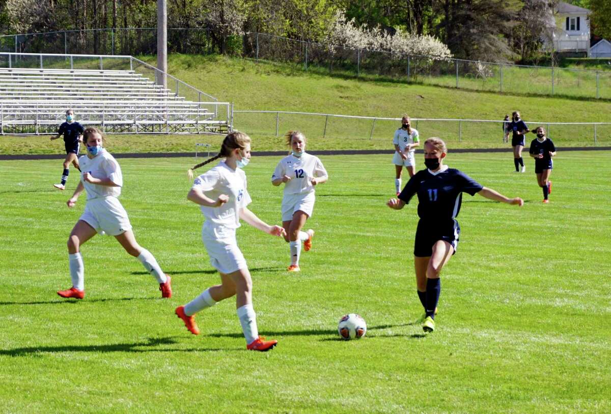 Crossroads Charter Academy junior Jessica Cole dribbles with the ball during Wednesday's soccer match against Gladwin. Cole scored one of CCA's two goals in the match. (Pioneer photo/Joe Judd)