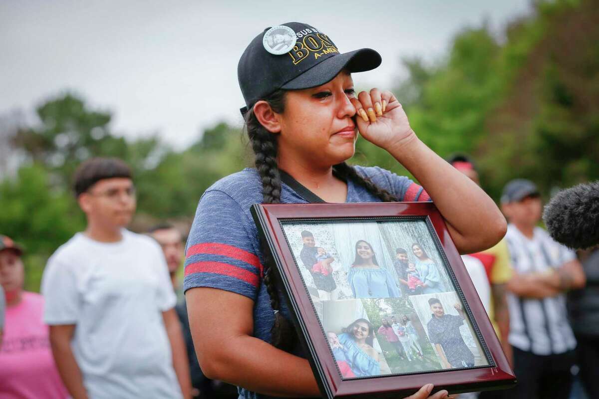 Ashley Hernandez becomes overwhelmed with emotion as she spoke about her sister, Erica Hernandez, during a press conference at the site where her body was found in a submerged SUV Wednesday, May 12, 2021, in Pearland.