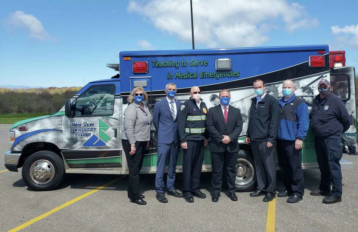 Left to Right: Christy Christmas, Dean of Occupational Programs, Dr. Mark Kinney, Vice President of Academics, Jeff Stockhill, Life EMS Director of North Operations, Scott Ward, President, Dan Yost, Emergency Medical Services Program Director, David Quinn, EMT Lab Instructor, Jim Petrie, Emergency Rescue and Extraction Instructor, in front of WSCC's ambulance donated from Life EMS. (Submitted photo)