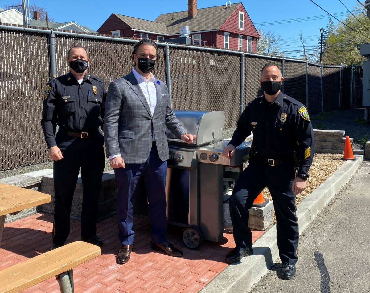 Fairfield Police Department Capt. Keith Broderick, Fairfield resident Daniel Blanco, and Fairfield Chief of Police Robert Kalamaras stand with a grill during National Police Week. The week goes through May 15. The week began May 9. Blanco recently donated the grill to the Fairfield Police Department. The department has been using the grill for the week to provide meals for Fairfield Police personnel of each of the department's shifts, and divisions. The grill is also the latest addition to the department's new outdoor break area for sworn, and civilian personnel.