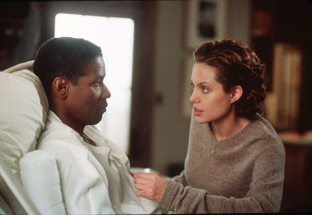 Denzel Washington teams up with Angelina Jolie in “The Bone Collector.”