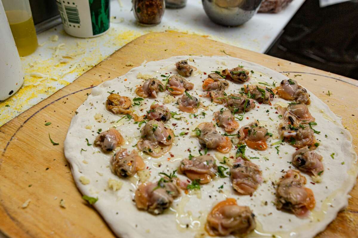 Fresh Clam pizza being made at Zuppardi's in West Haven on April 23, 2021.