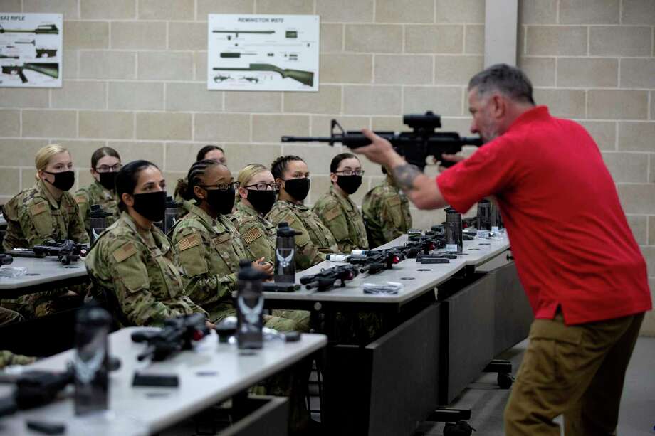 Female trainees are prepped for their first time at the gun range using live rounds during Beast week at Joint Base San Antonio-Lackland. Photo: Jessica Phelps /Staff Photographer / **MANDATORY CREDIT FOR PHOTOG AND SAN ANTONIO EXPRESS-NEWS/NO SALES/MAGS OUT/TV  © 2021 San Antonio Express-News