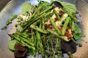 Seared asparagus with halloumi herbs Caroline Barrett made at Different Drummer's Kitchen in Stuyvesant Plaza on Thursday, May 6, 2021 in Guilderland, N.Y. (Lori Van Buren/Times Union)