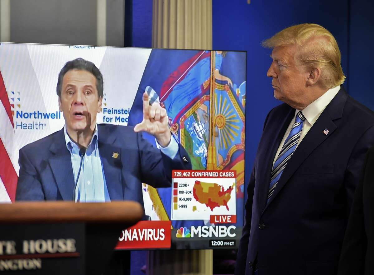 At a coronavirus briefing, President Trump shows video of Andrew Cuomo.