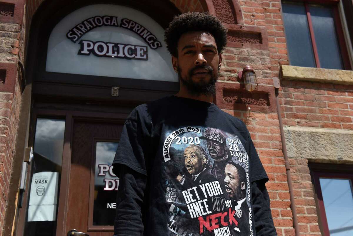 Black Lives Matter activist Lexis Figuereo stands outside the Saratoga Springs Police Station on Thursday, May 13, 2021, in Saratoga Springs, N.Y. (Will Waldron/Times Union)