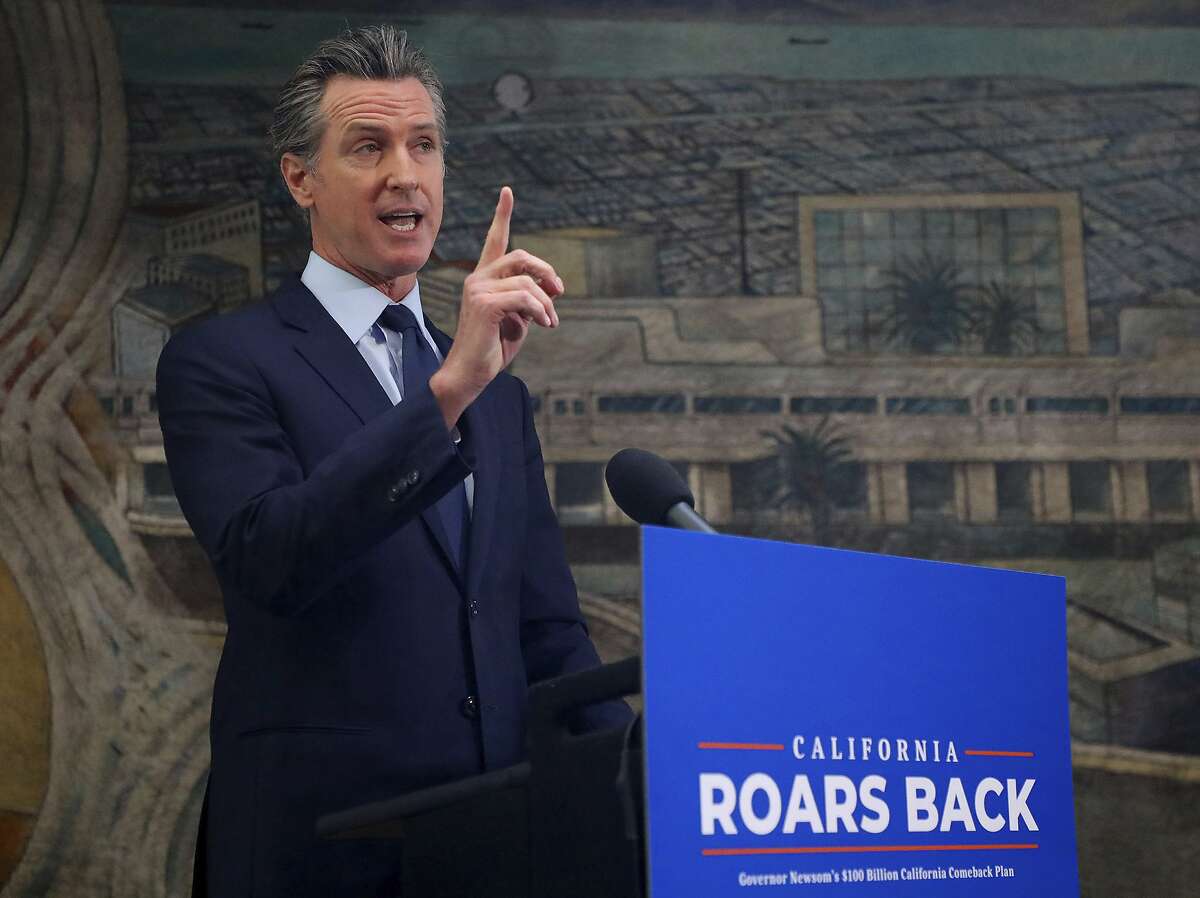Gov. Gavin Newsom speaks in Oakland’s Fruitvale neighborhood on his “California Roars Back” tour, promoting his proposals to spend billions of dollars from California’s huge budget surplus.