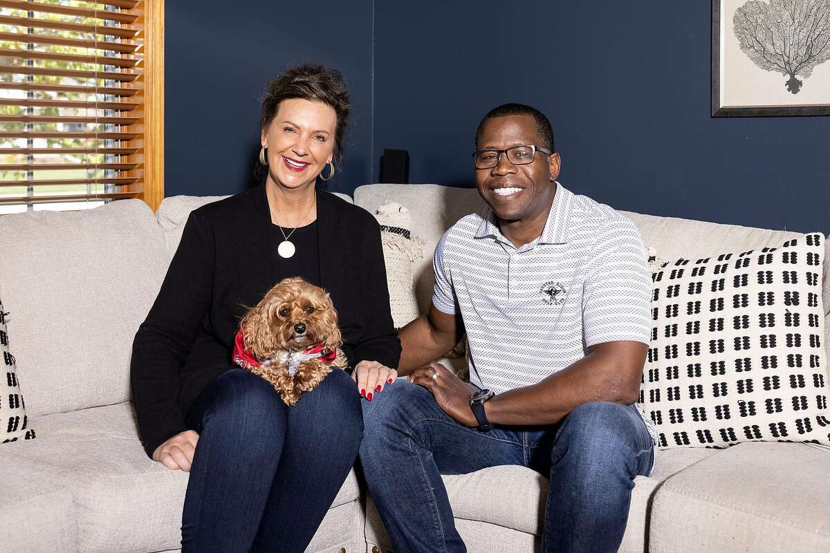 A portrait of Trey Lance's parents, Angie and Carlton Lance, at their home in Marshall, Minn., on Tuesday, May 11, 2021.