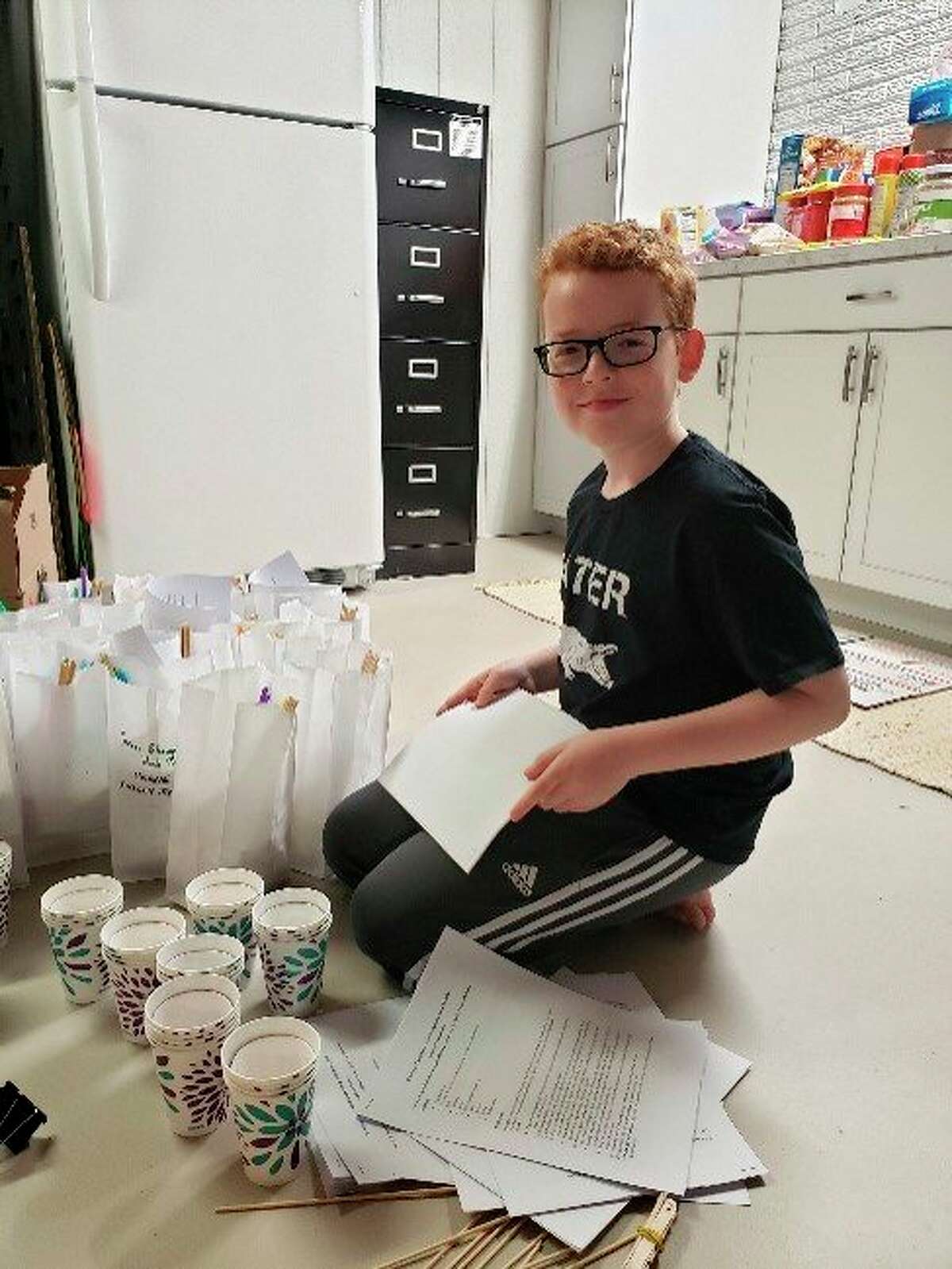 Sixth-grader Hayden Rozewski is St. John's 2020-2021 Chief Science Officer. Together with his parents, Chuck and Stephanie Rozewski, they developed and produced five at-home STEM projects. (Photos Provided)