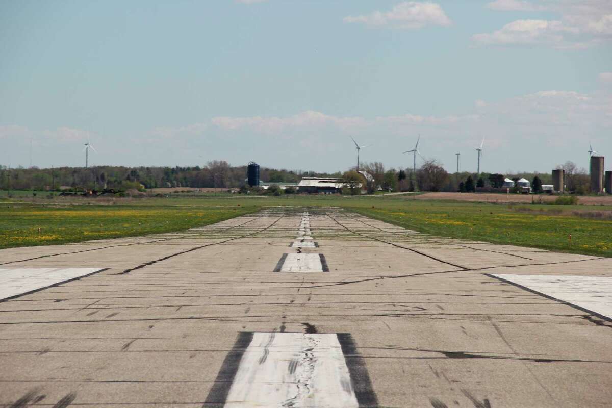 The long runway at Huron County Memorial Airport, which is scheduled to have a new layer of asphalt put on over the summer. The runway will be closed for two months while the shorter runway will be closed for two week. (Robert Creenan/Huron Daily Tribune)