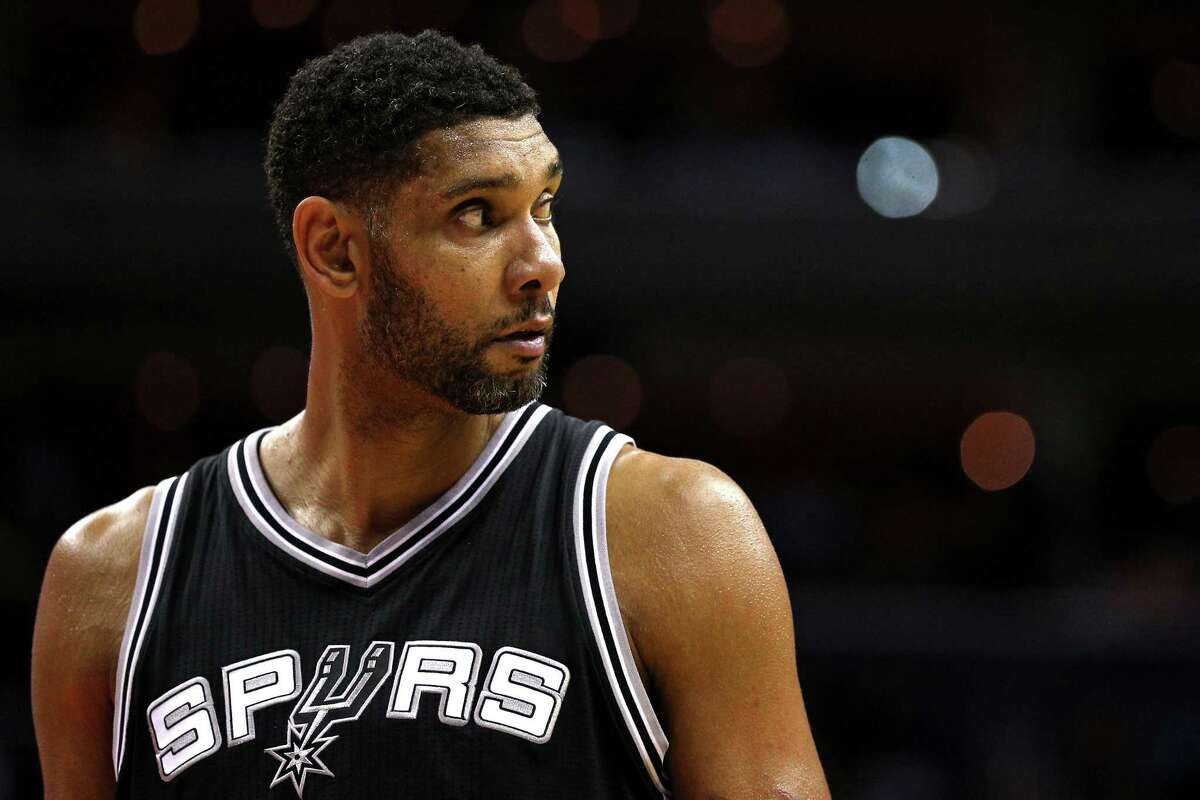 FILE - JULY 11, 2016: It was reported that Tim Duncan of the San Antonio Spurs is retiring from the NBA after 19 seasons July 11, 2016. WASHINGTON, DC - NOVEMBER 04: Tim Duncan #21 of the San Antonio Spurs looks on against the Washington Wizards during the second half at Verizon Center on November 4, 2015 in Washington, DC. The Washington Wizards won, 102-99. NOTE TO USER: User expressly acknowledges and agrees that, by downloading and or using this photograph, User is consenting to the terms and conditions of the Getty Images License Agreement. (Photo by Patrick Smith/Getty Images)