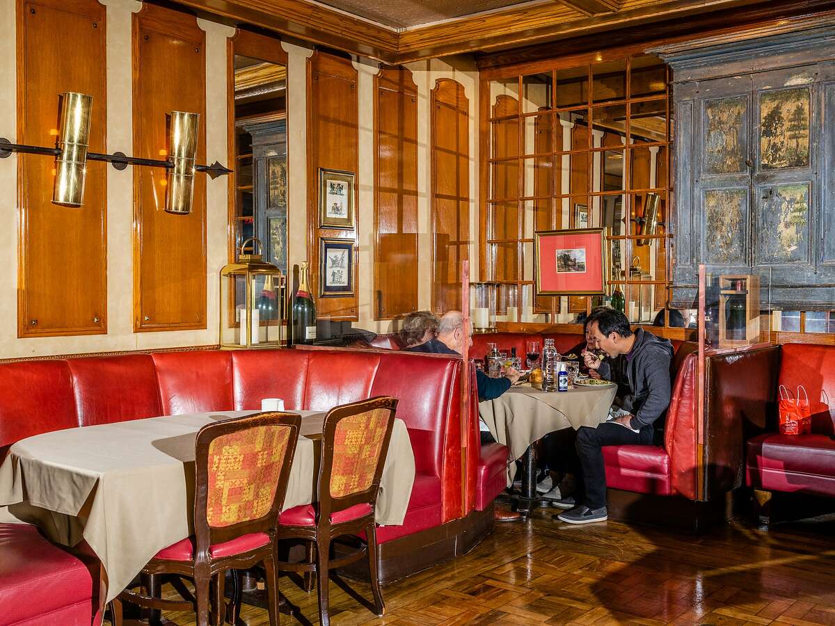 Diners spaced out in the dining room after indoor dining restrictions allow for up to 25% capacity at House of Prime Rib in San Francisco, Calif. on Friday, October 30, 2020.