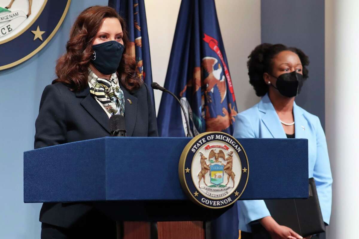In this photo provided by the Michigan Office of the Governor, Gov. Gretchen Whitmer addresses the state during a speech, Wednesday, May 12, 2021, in Lansing. Whitmer announced Friday the Michigan Department of Health and Human Services is updating the Gatherings and Mask Order to align with the U.S. Centers for Disease Control and Prevention's latest guidance on face coverings, meaning those fully vaccinated against COVID-19 can go without masks in most indoor settings. (Michigan Office of the Governor via AP)
