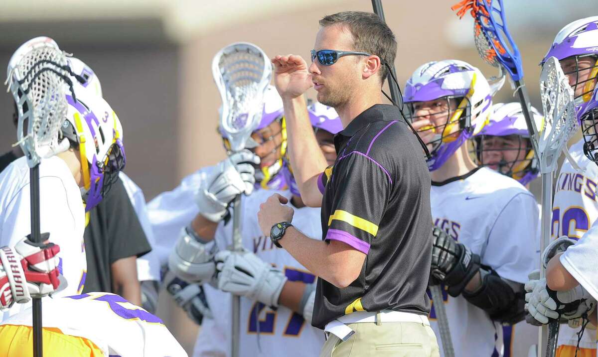 Westhill boys lacrosse coach Scott Stone talks with his team during a 2017 game in Stamford. Stone currently deployed overseas with the National Guard.