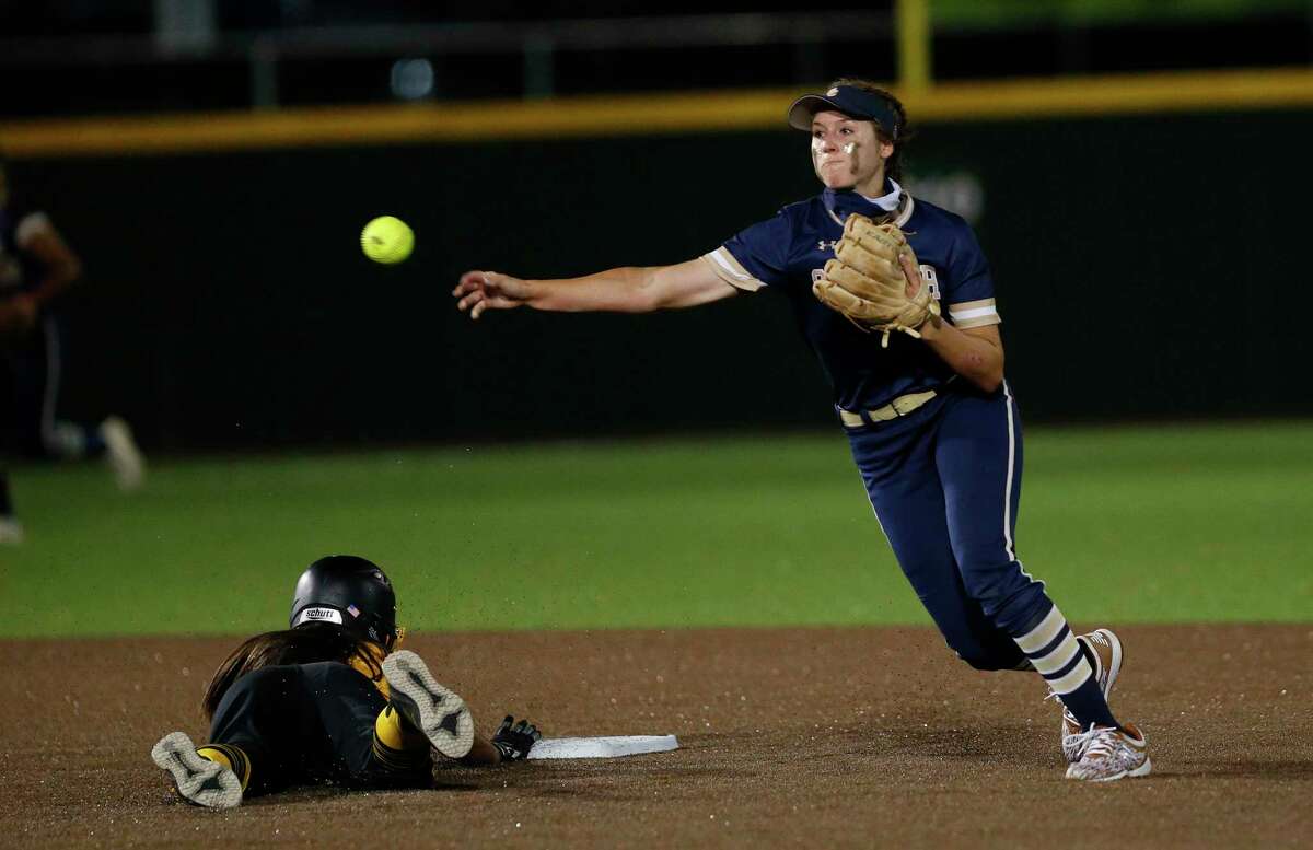 O’Connor Leighann Goode #7 completes a double play in the 8th inning to end the game. Game 2 O'Connor vs. Brennan third-round Class 6A softball playoff at Northside Field No. on Friday, May 14, 2021 at Northside Field #2.