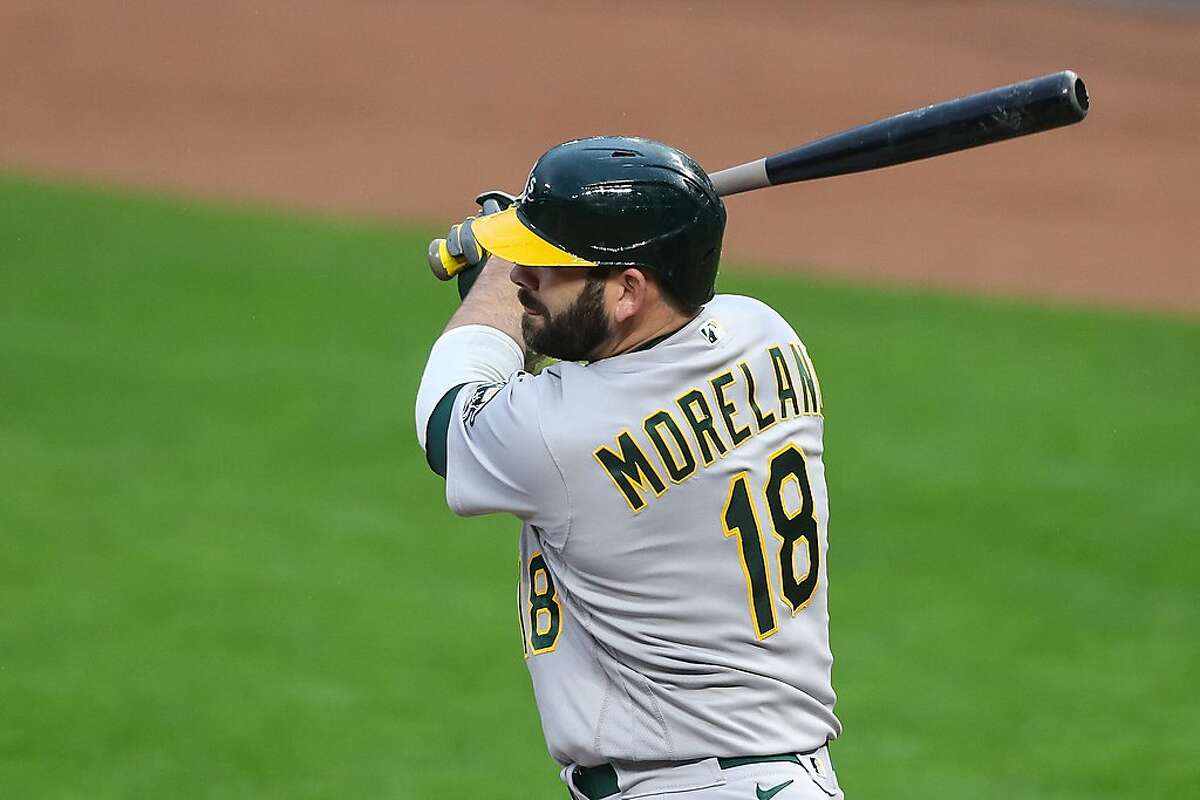 MINNEAPOLIS, MN - MAY 14: Mitch Moreland #18 of the Oakland Athletics hits a double against the Minnesota Twins in the first inning of the game at Target Field on May 14, 2021 in Minneapolis, Minnesota. (Photo by David Berding/Getty Images)