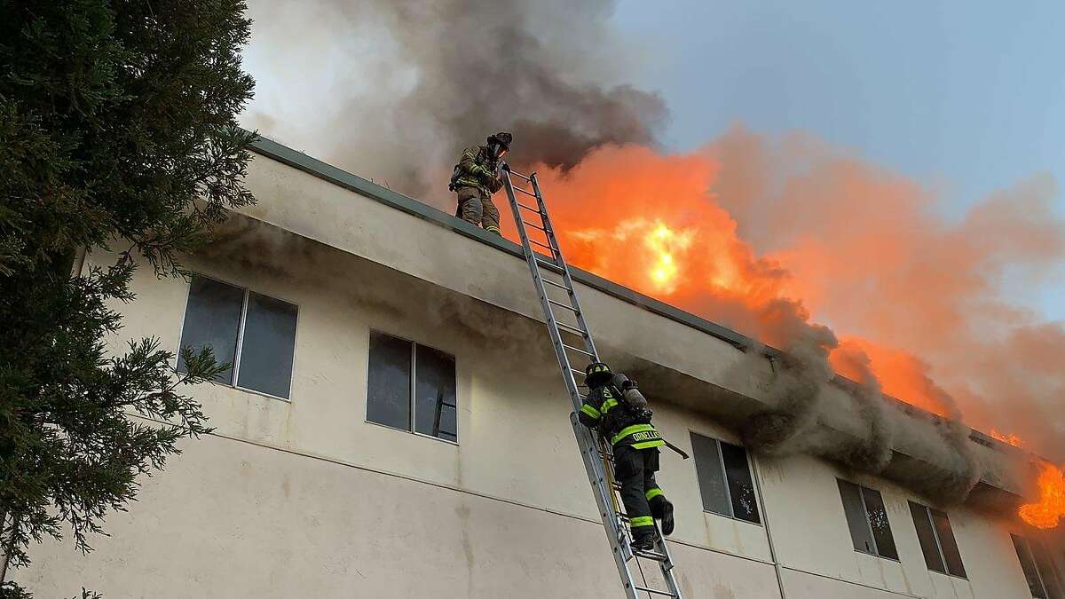 This file photo shows firefighters responding to a blaze at the Christ Community Church of the Nazarene in Concord. The fire that damaged the Christ Community Church of the Nazarene in Concord earlier this week was caused by “human activity” in a crawlspace discovered under the church where someone was sheltering, fire officials said.