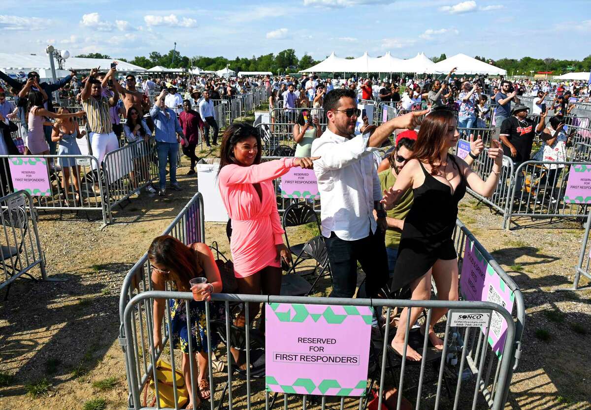 At Pimlico, infield revelers for the Preakness were kept in socially distanced pods and were treated to a triple-bill concert featuring Major Lazer, 2 Chainz and D-Nice.