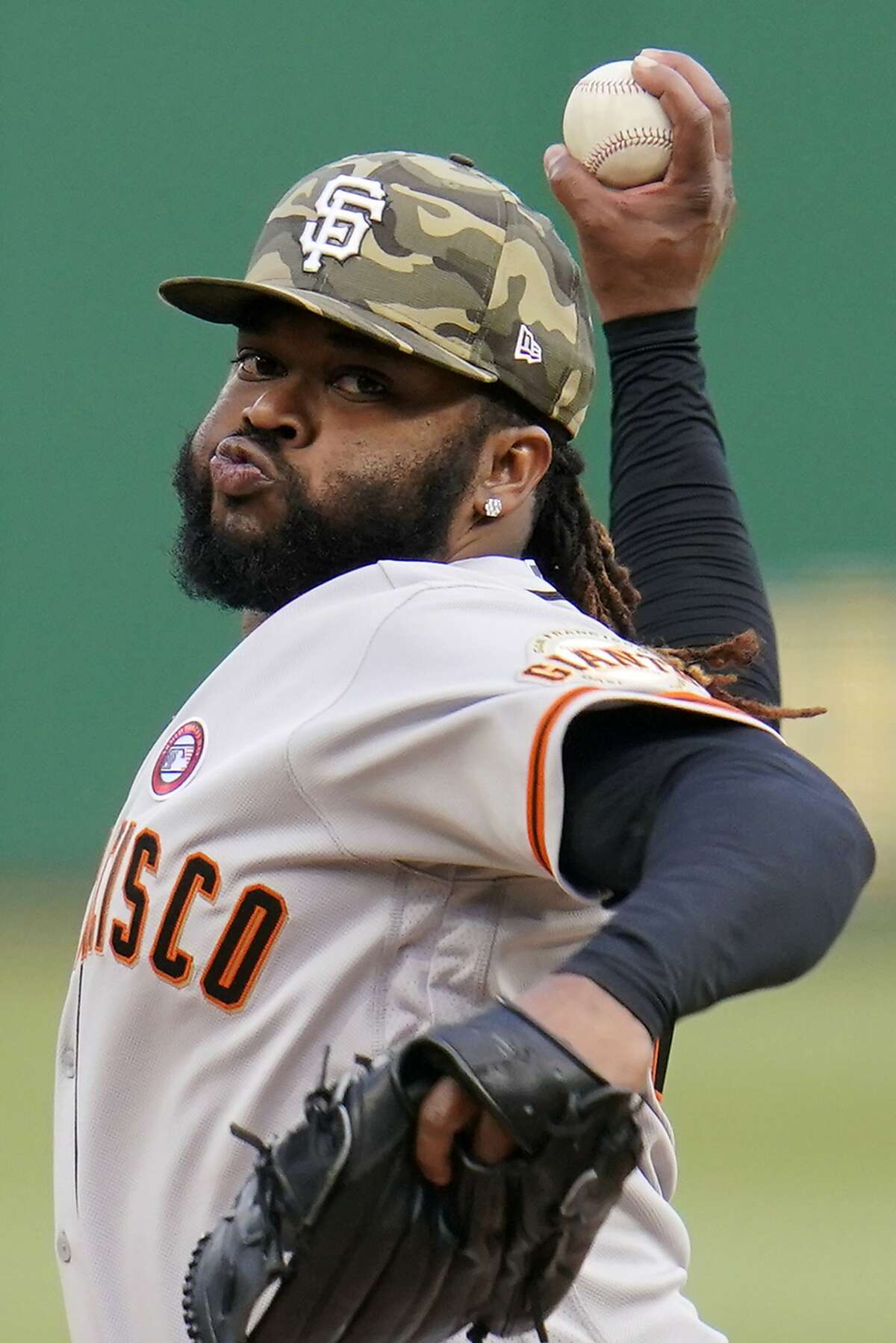 San Francisco Giants starting pitcher Johnny Cueto delivers during the first inning of a baseball game against the Pittsburgh Pirates in Pittsburgh, Saturday, May 15, 2021. (AP Photo/Gene J. Puskar)