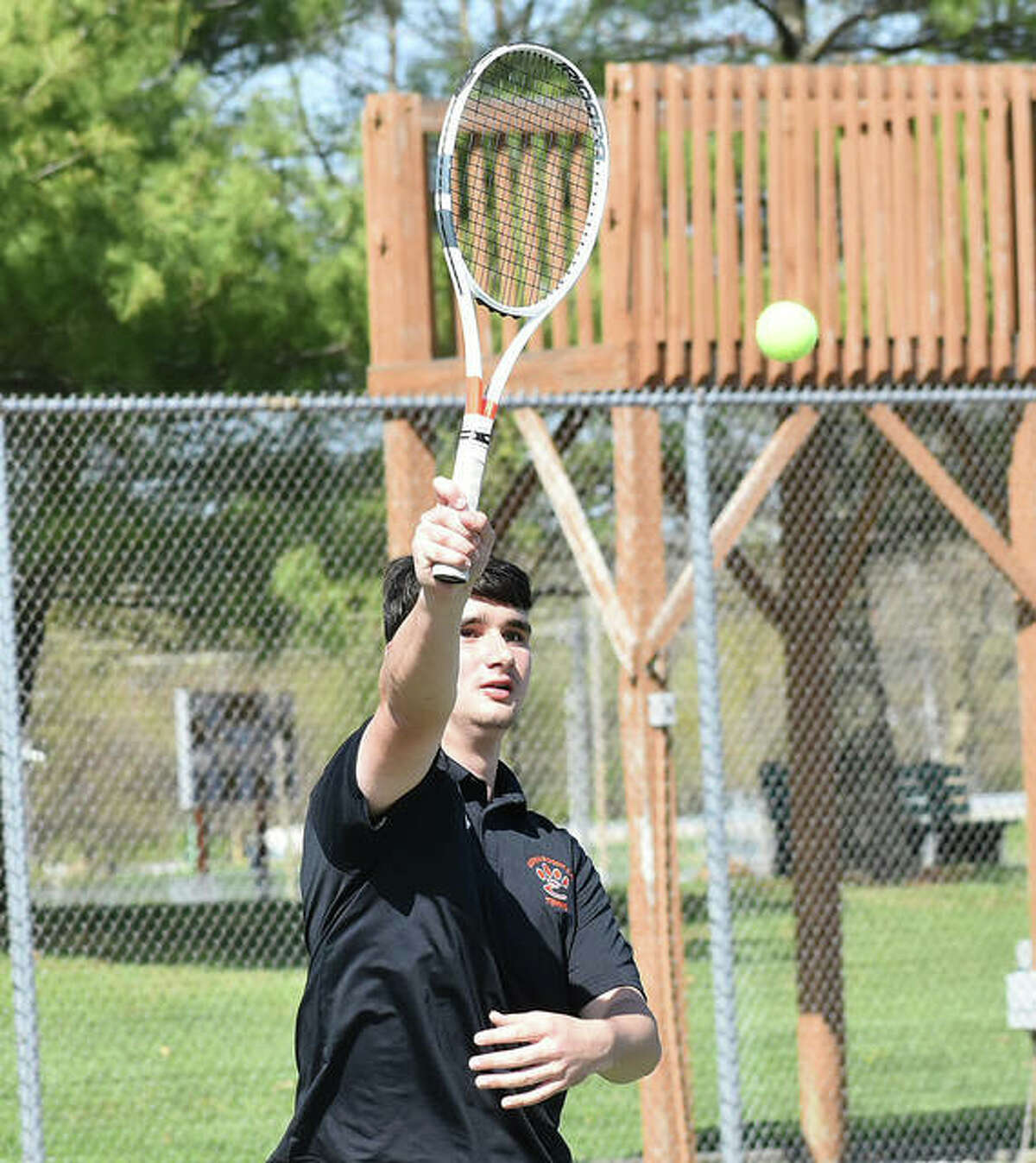 Edwardsville’s Michael Karibian hits a shot from near the net in his doubles match against Belleville East on April 13 inside the EHS Tennis Center. Karibian and partner Jade Dynamic tied for 15th place at No. 1 doubles in the Pitchford Invitational at Hersey High School.