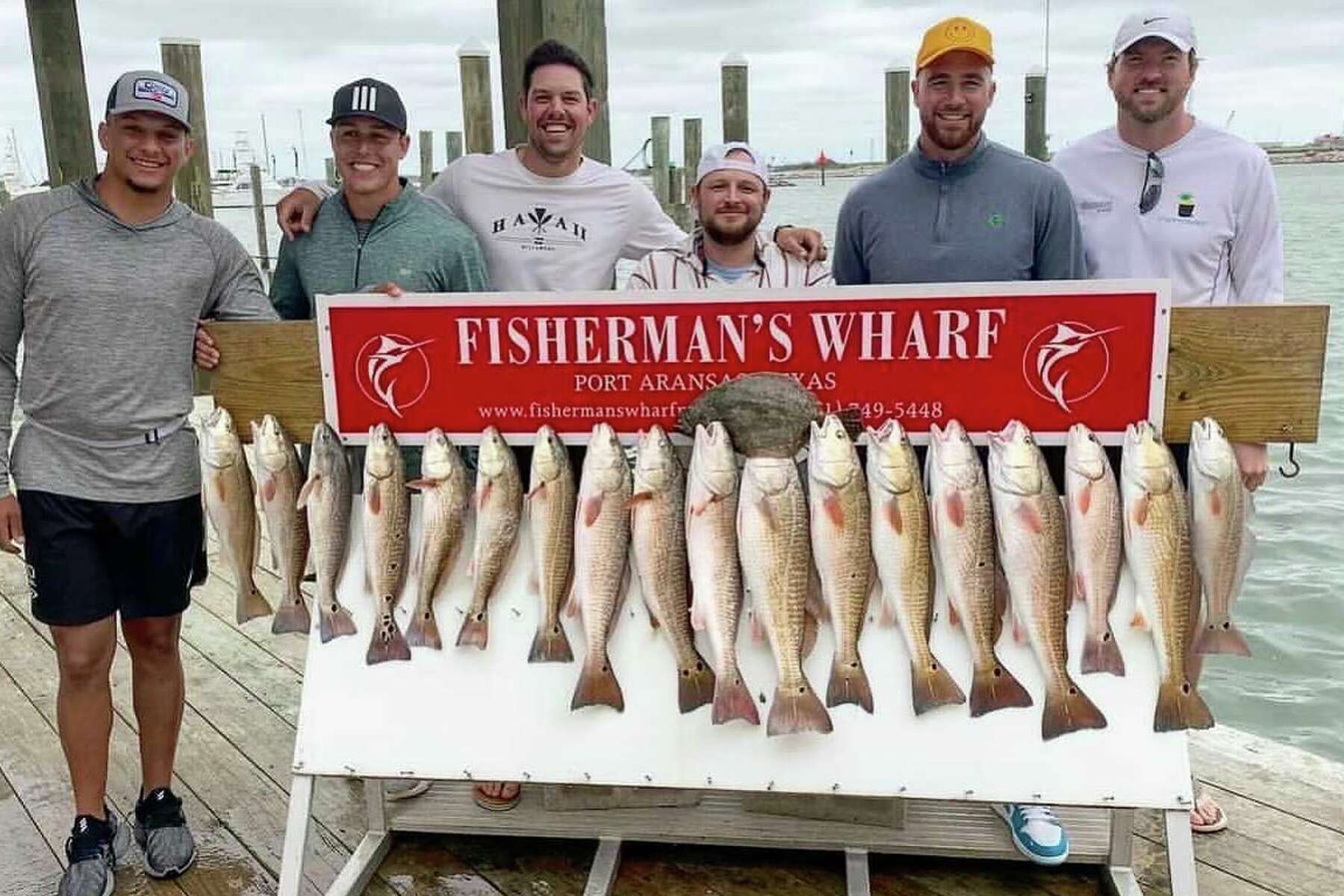 Photo shows Kansas City Chiefs players Patrick Mahomes, Travis Kelce  visiting Port Aransas