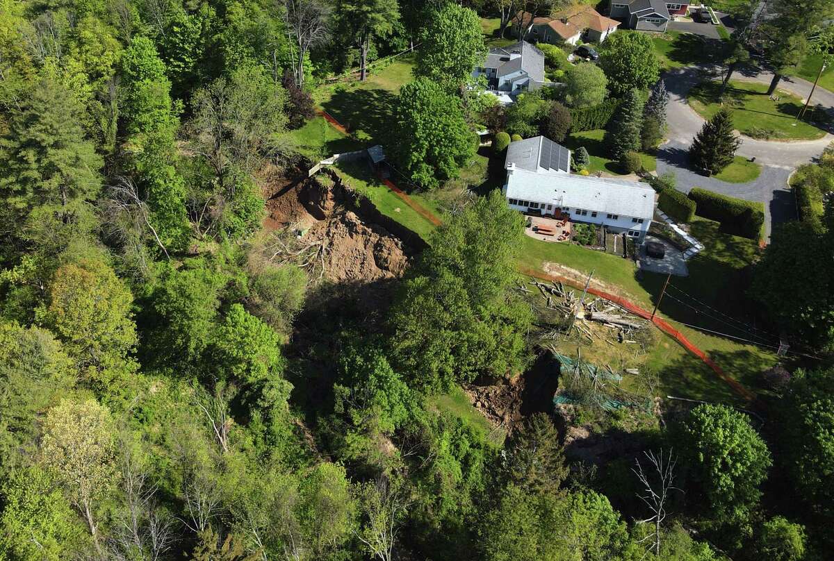 Photos: Delmar landslide makes parts of two backyards vanish