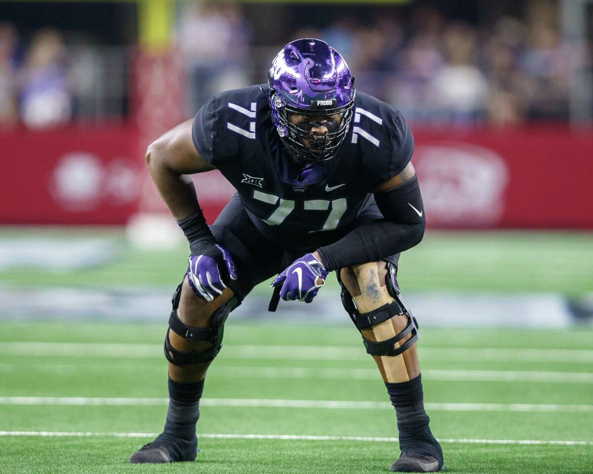 ARLINGTON, TX - SEPTEMBER 15: TCU Horned Frogs offensive tackle Lucas Niang (#77) prepares for the snap during the Advocare Showdown college football game between the Ohio State Buckeyes and the TCU Horned Frogs on September 15, 2018 at AT&T Stadium in Arlington, Texas. Ohio State won the game 40-28. (Photo by Matthew Visinsky/Icon Sportswire via Getty Images)