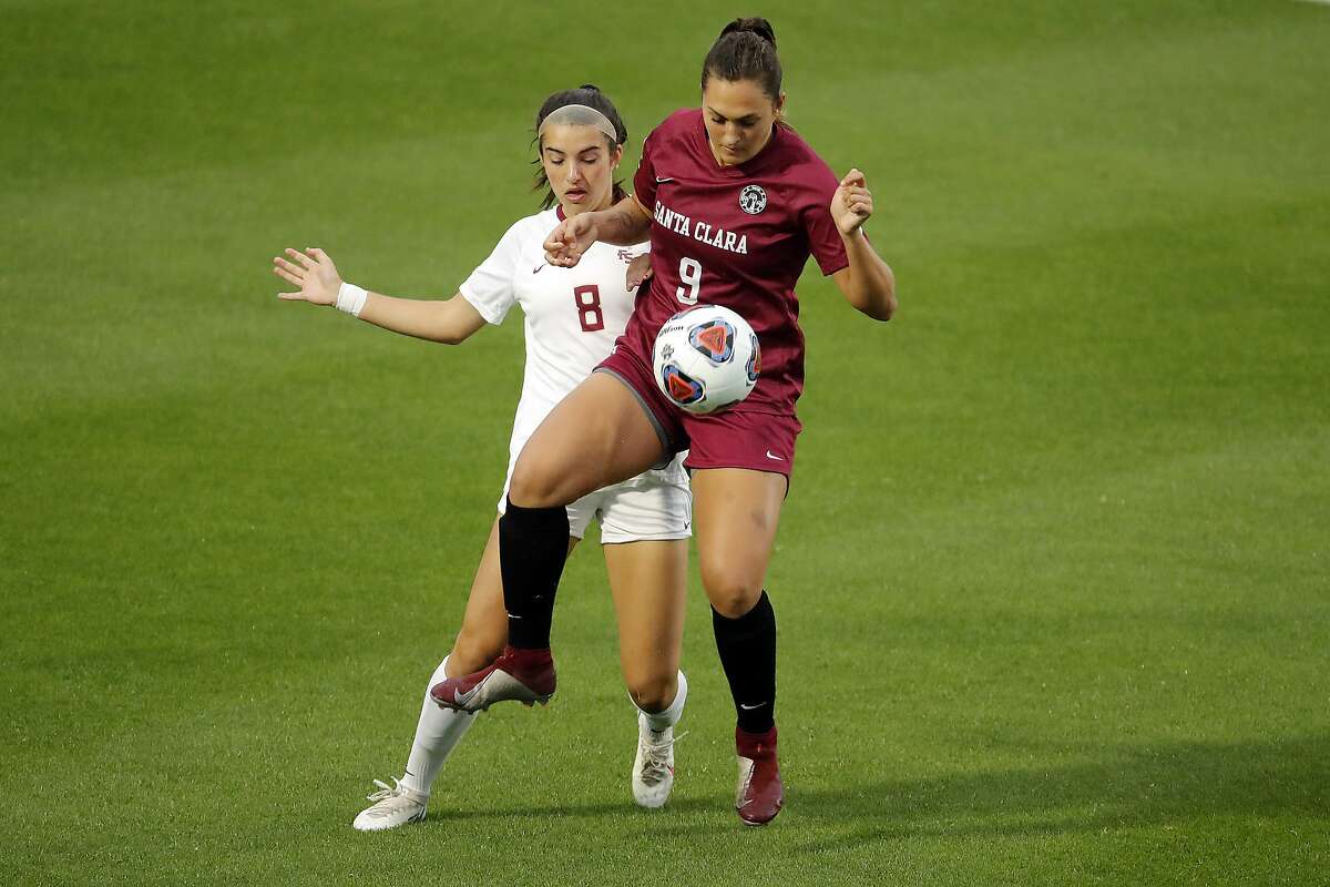 Santa Clara midfielder Izzy D'Aquila (9) controls the ball in front of Florida State forward Lauren Flynn (8) during the first half of the NCAA College Cup championship soccer match in Cary, N.C., Monday, May 17, 2021. (AP Photo/Karl B DeBlaker)
