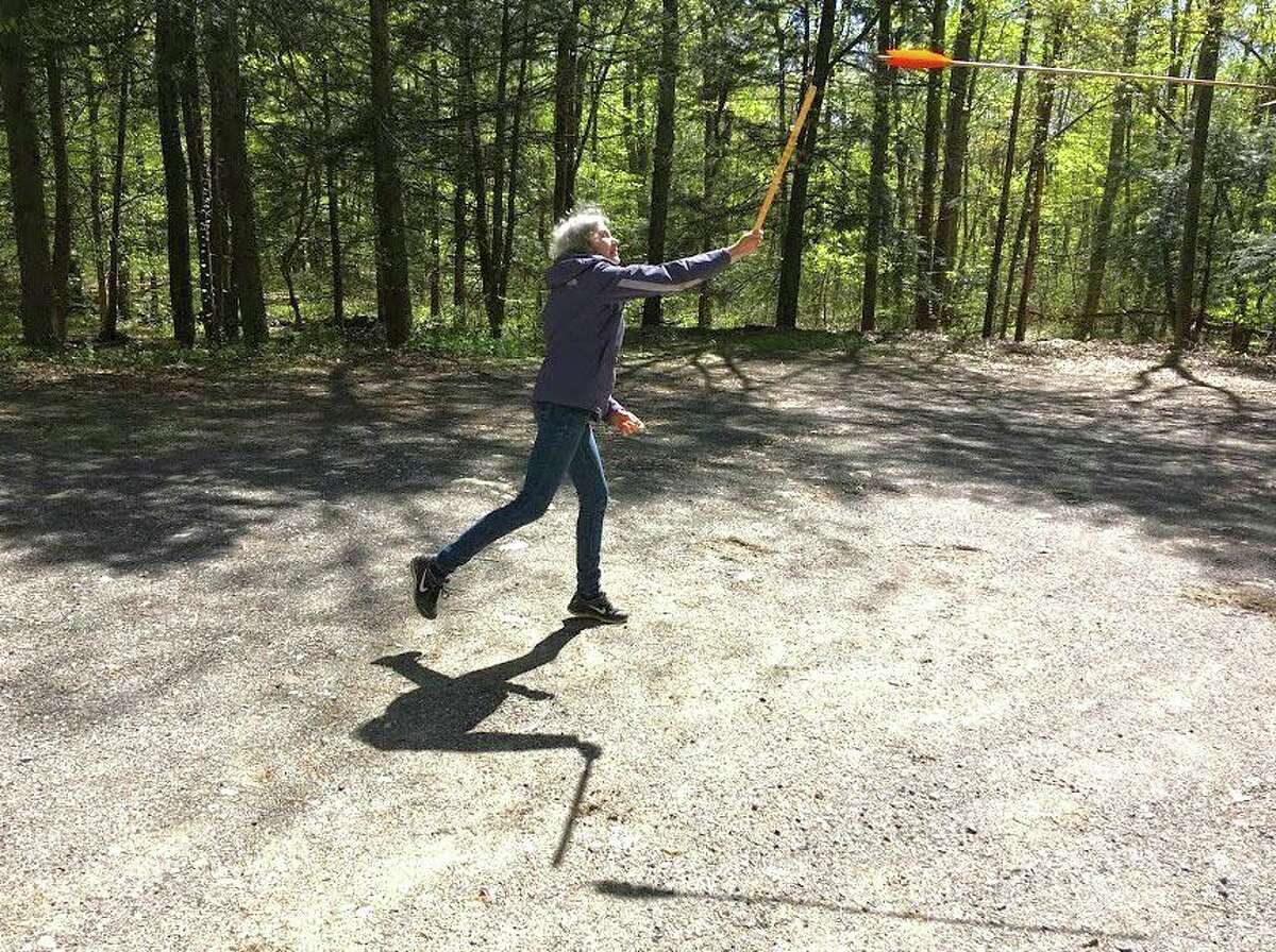 Demonstration of using an atlatl.