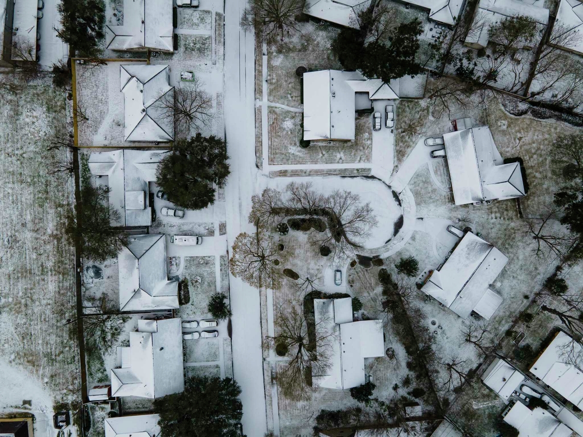 Homes in the Westbury neighborhood are covered in snow along with the rest of Houston, Monday, Feb. 15, 2021, in Houston.