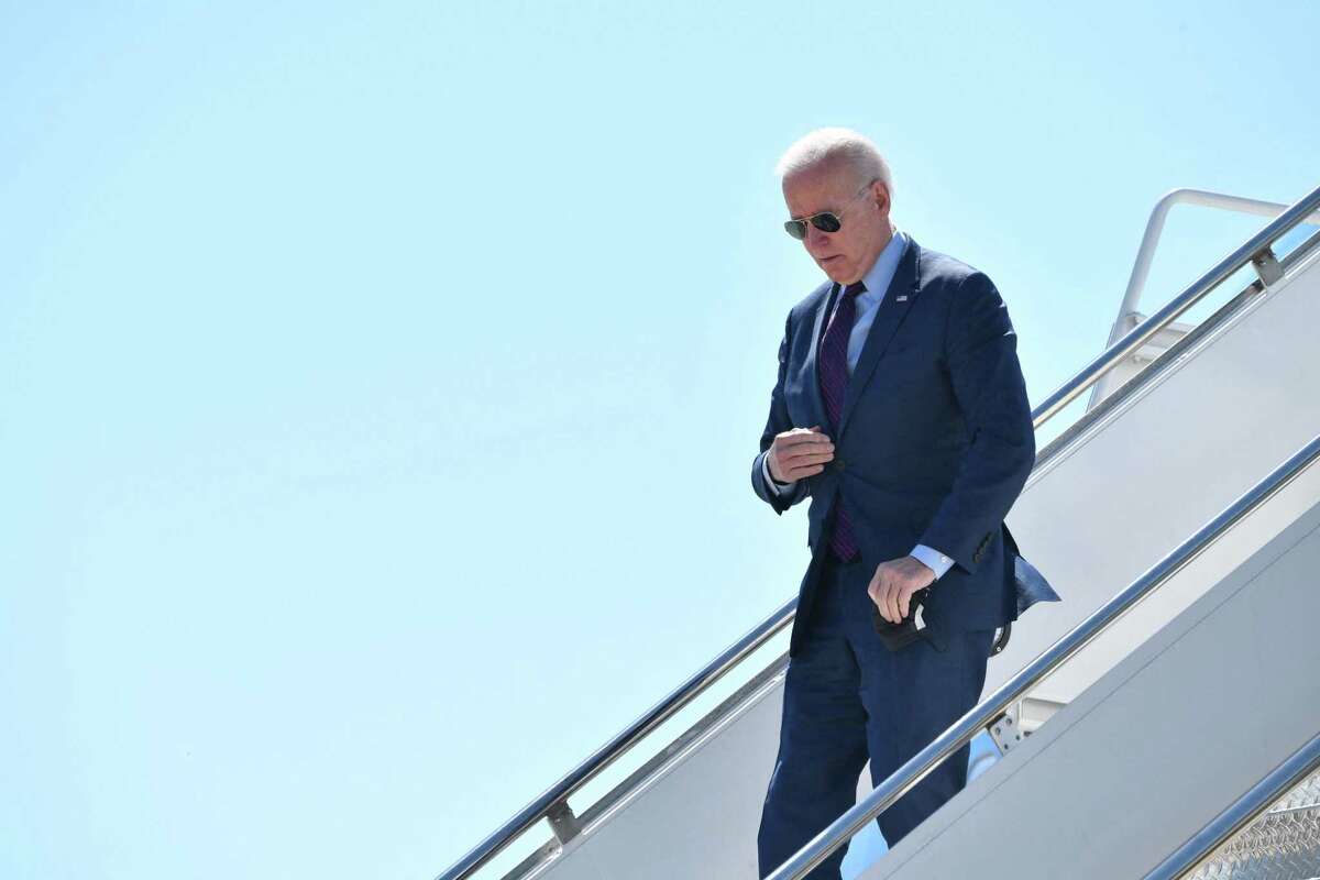 President Joe Biden arrives at Detroit Metropolitan Wayne County Airport in Detroit, Mich., on Tuesday.
