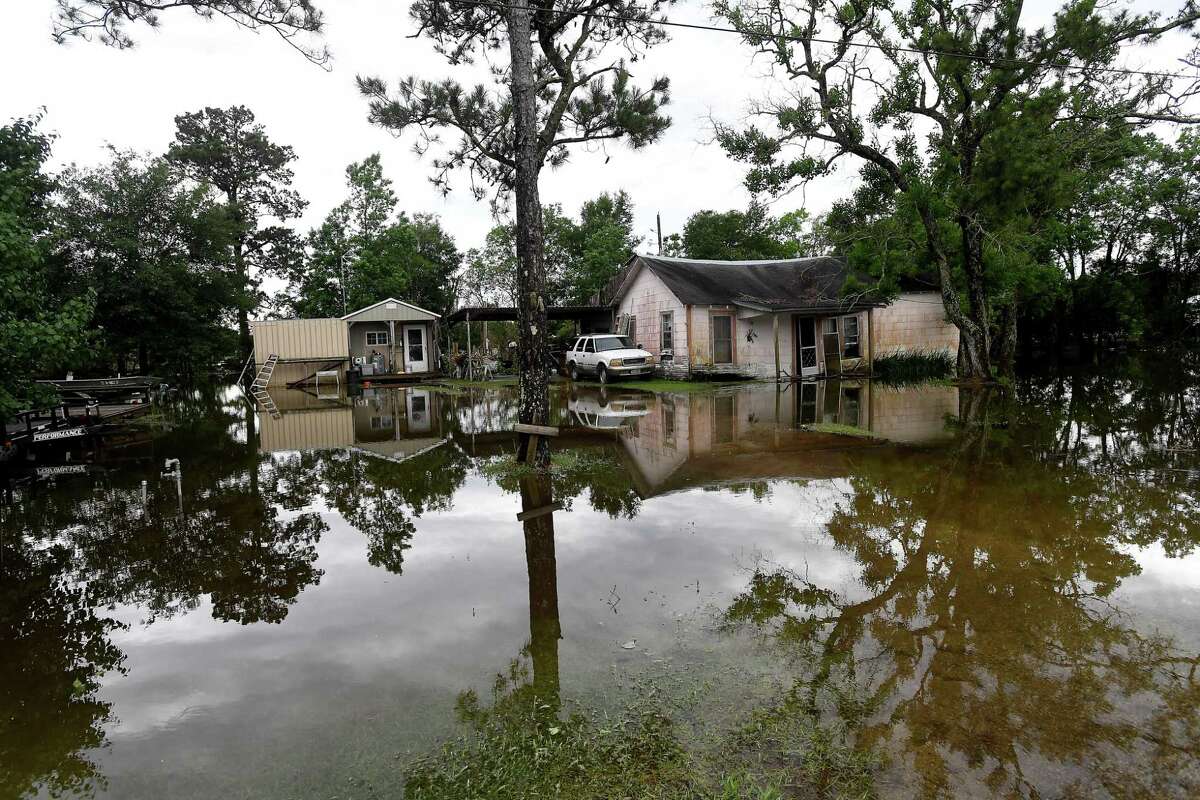 Flooding is seen in Fannett Tuesday. The area received over a foot of rainfall Monday, flooding area bayous and several yards and homes. Photo made Tuesday, May 18, 2021 Kim Brent/The Enterprise