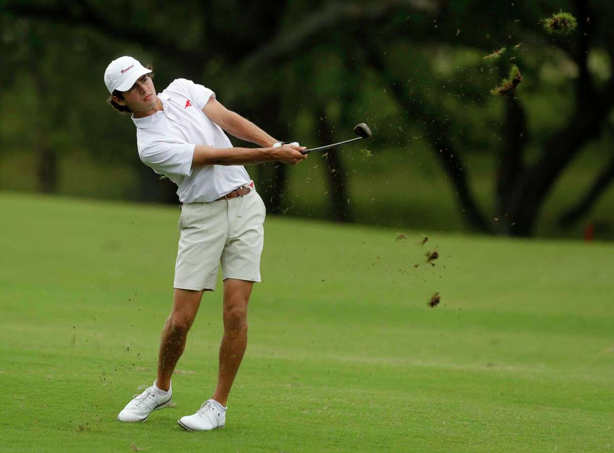 Jeffery Zatorski of Memorial hits his second shot on the 9th fairway during the Class 6A UIL State Golf Championship at Legacy Hills Golf Club, Tuesday, May 18, 2021, in Georgetown.