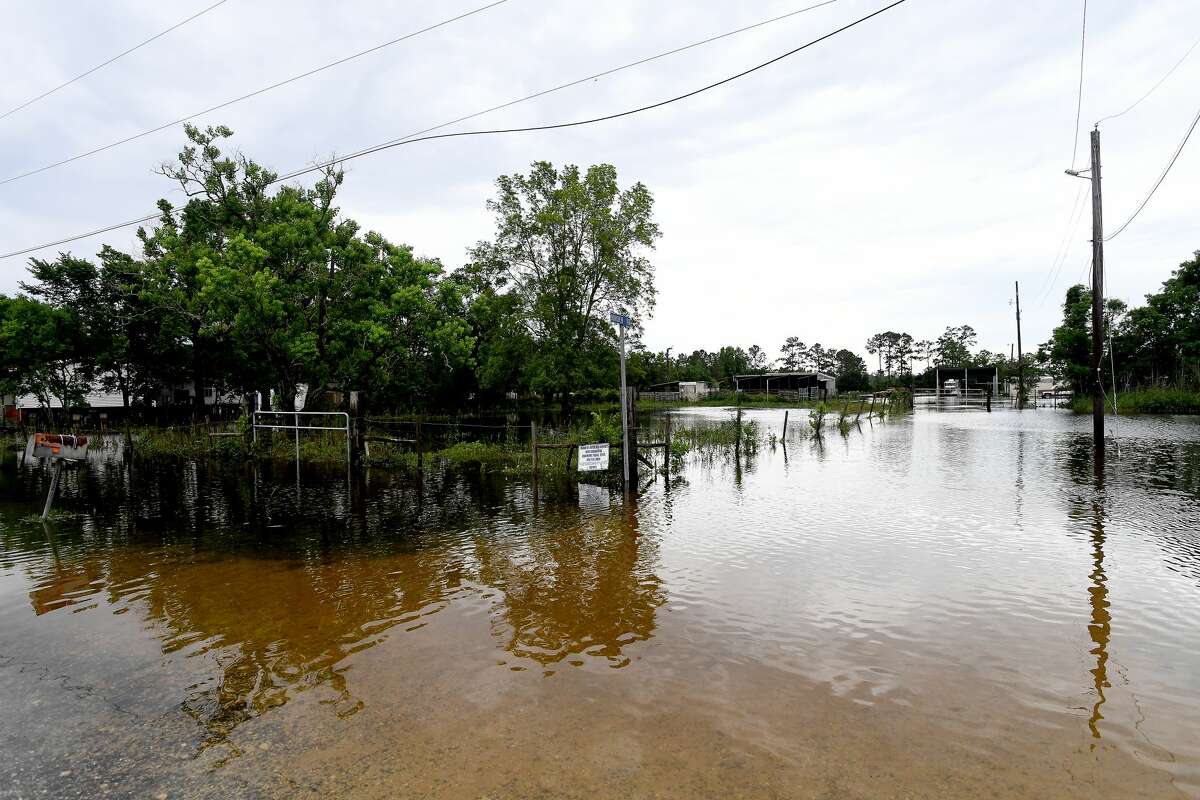 Flooding is seen in Fannett Tuesday. The area received over a foot of rainfall Monday, flooding area bayous and several yards and homes. Photo made Tuesday, May 18, 2021 Kim Brent/The Enterprise