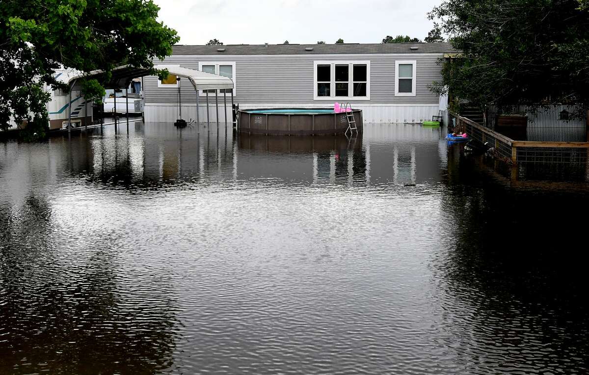 Flooding is seen in Fannett Tuesday. The area received over a foot of rainfall Monday, flooding area bayous and several yards and homes. Photo made Tuesday, May 18, 2021 Kim Brent/The Enterprise