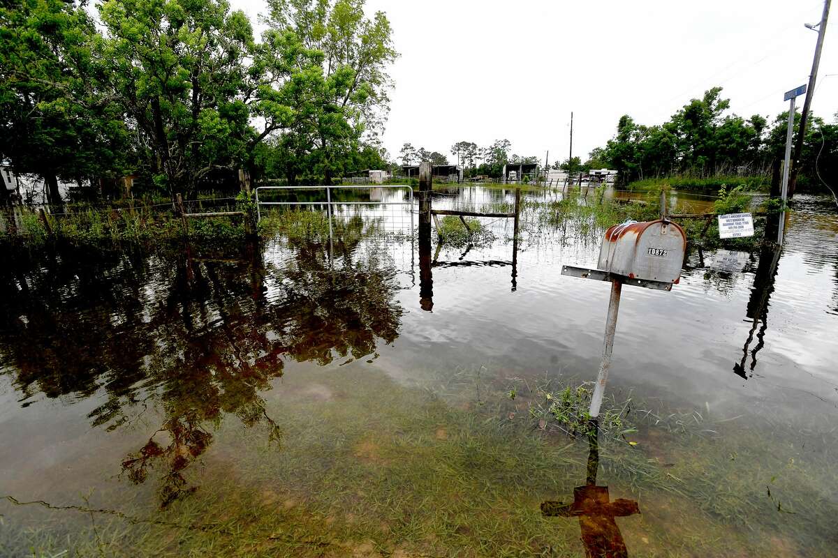 Flooding is seen in Fannett Tuesday. The area received over a foot of rainfall Monday, flooding area bayous and several yards and homes. Photo made Tuesday, May 18, 2021 Kim Brent/The Enterprise