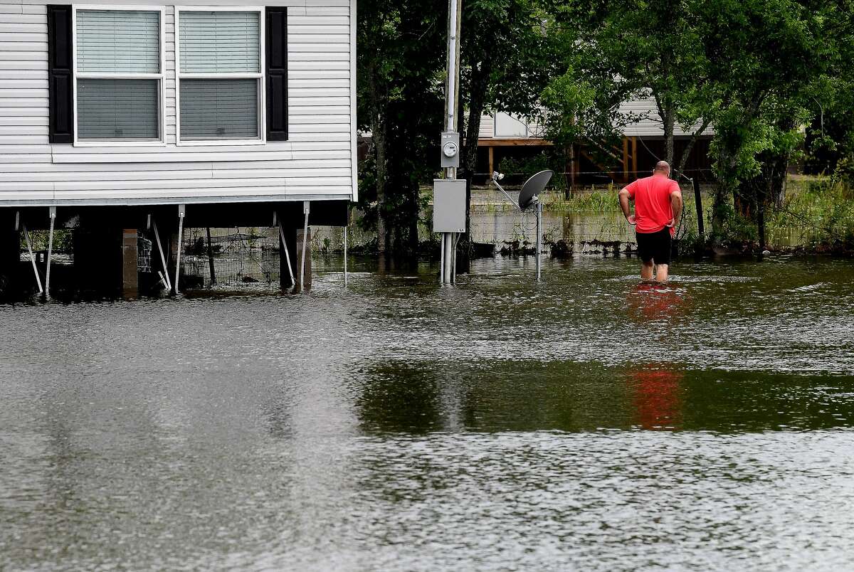 Flooding is seen in Fannett Tuesday. The area received over a foot of rainfall Monday, flooding area bayous and several yards and homes. Photo made Tuesday, May 18, 2021 Kim Brent/The Enterprise