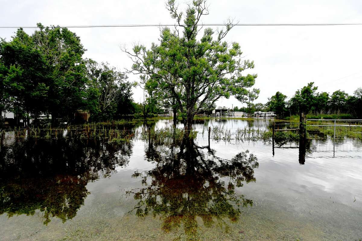 Flooding is seen in Fannett Tuesday. The area received over a foot of rainfall Monday, flooding area bayous and several yards and homes. Photo made Tuesday, May 18, 2021 Kim Brent/The Enterprise