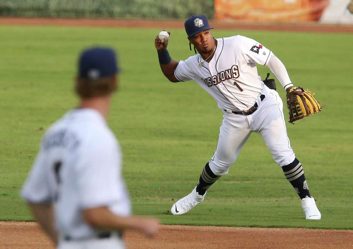San Antonio Missions infielder Eguy Rosario (1) throws to first base during their season home opener against the Frisco RoughRiders at Wolff Stadium on Tuesday, May 18, 2021.